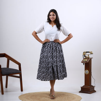 Cotton Hakoba White top black skirt